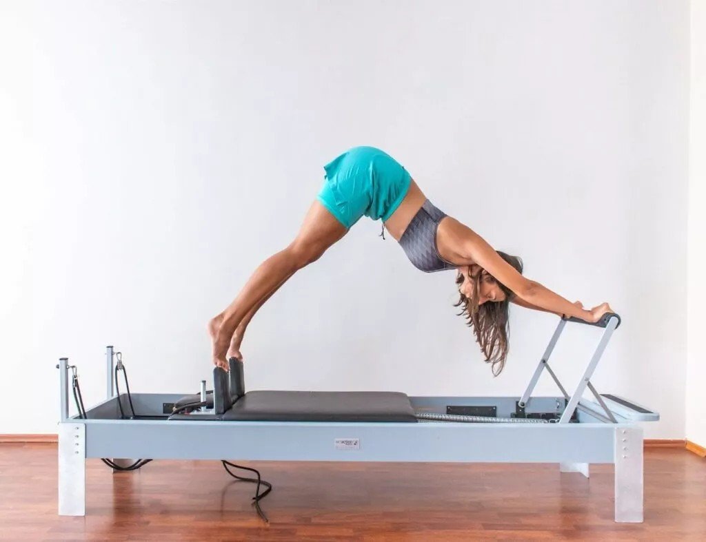 Girl performing Stott Pilates