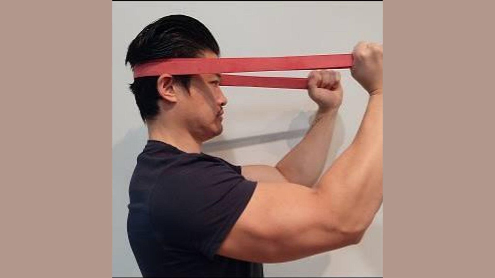Man doing neck strengthening exercise.
