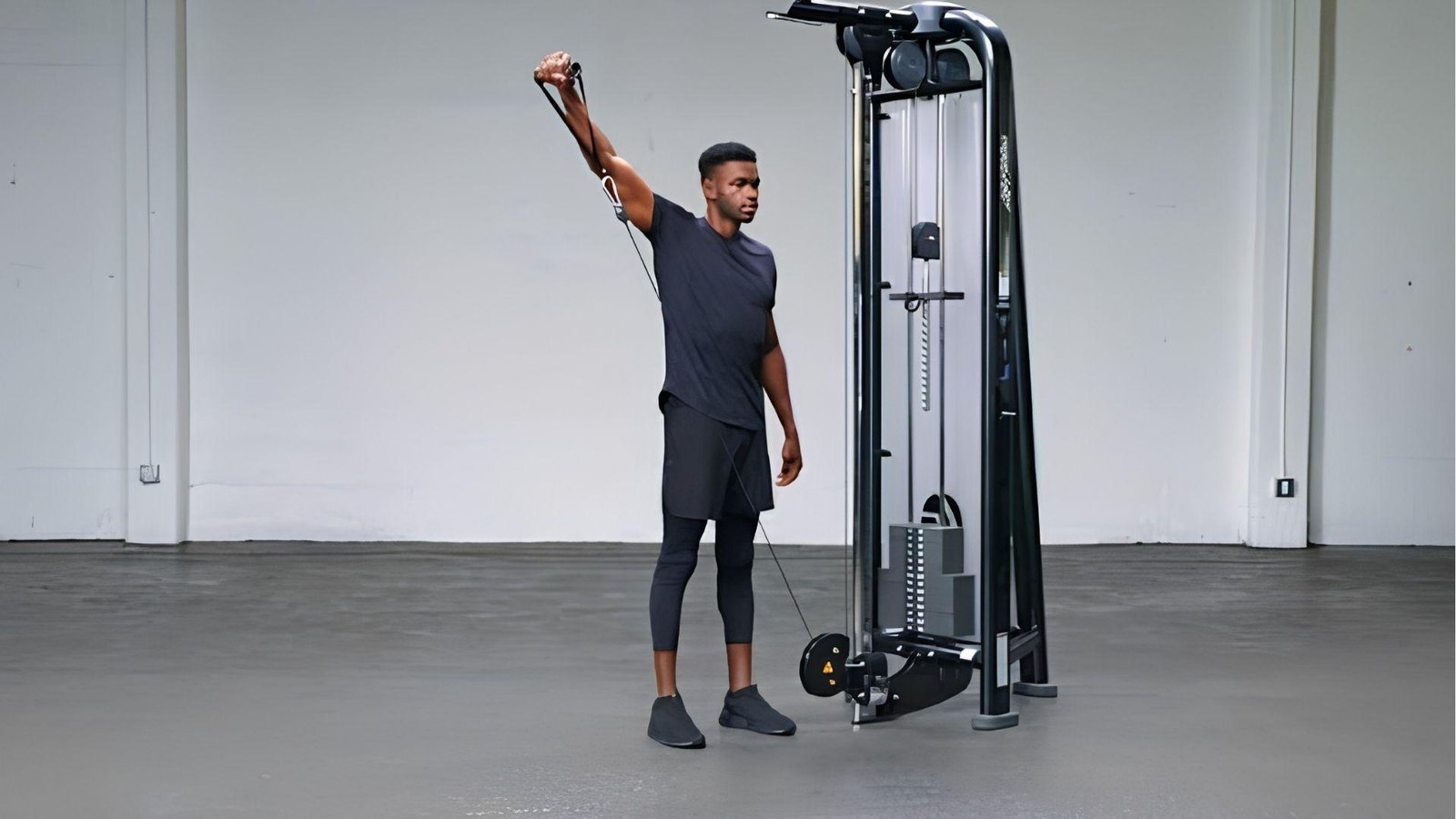 Behind-the-Back Cable Lateral Raise is one of the Best Cable Shoulder Workouts