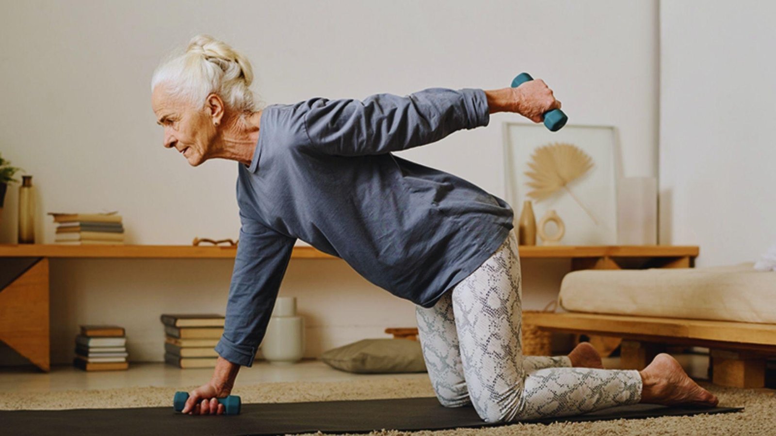 image of an old lady doing home exercise.
