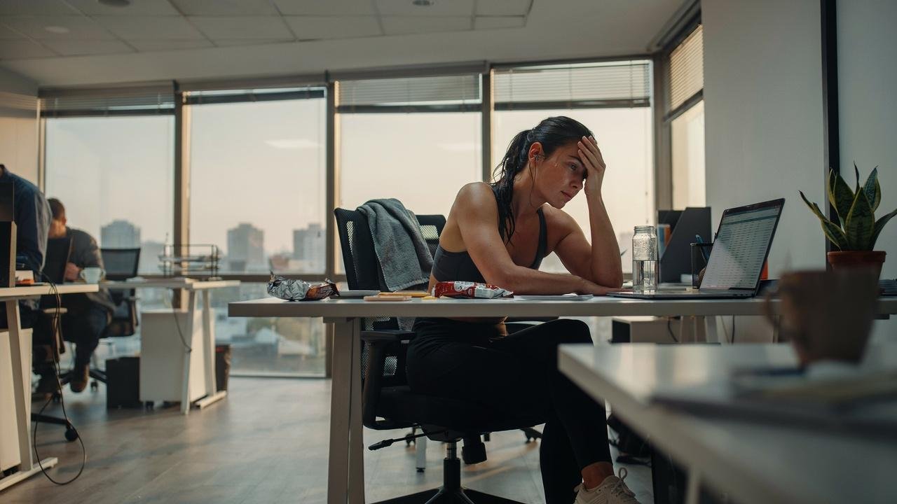 Person experiencing stress and poor concentration from overtraining.