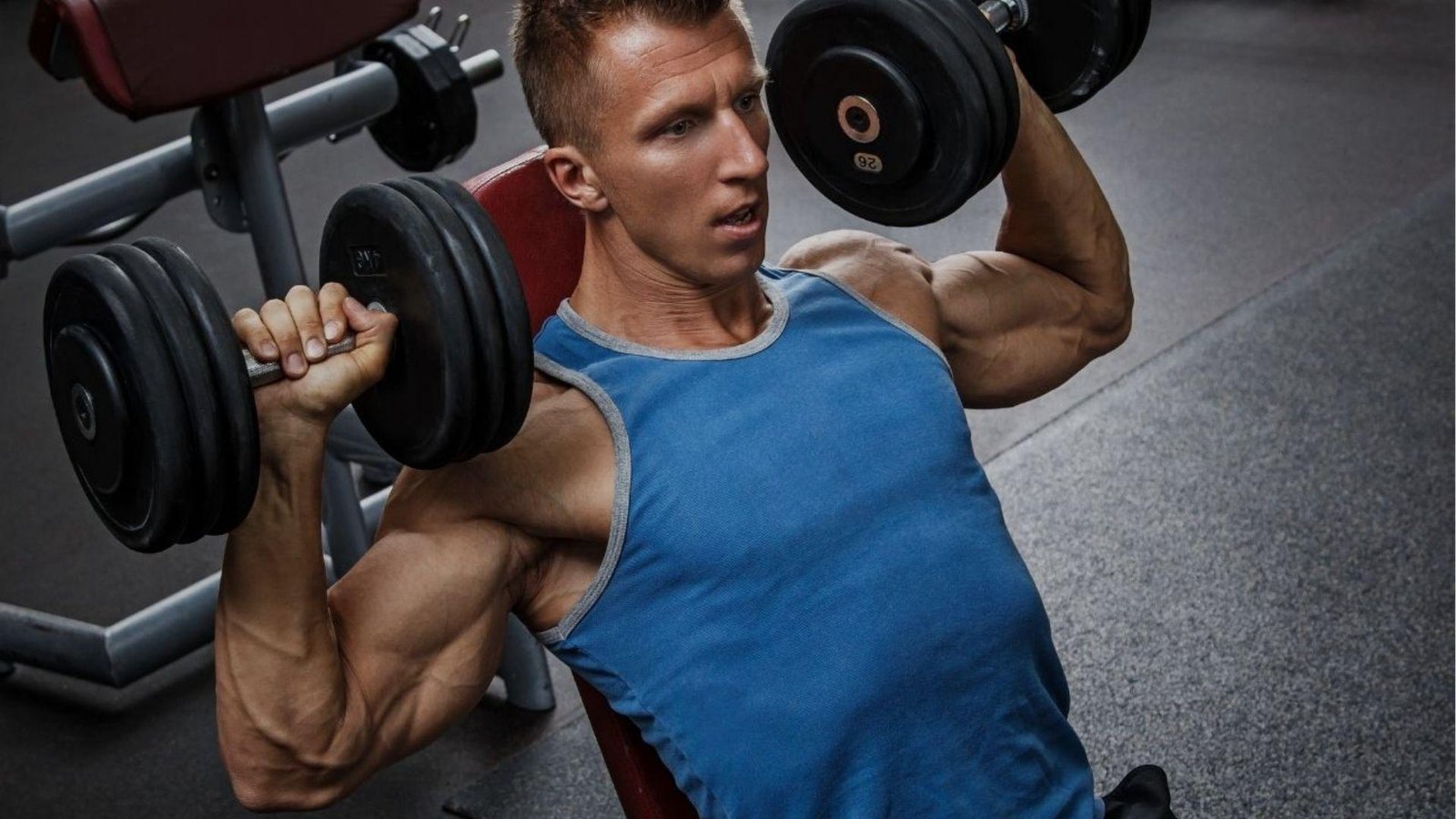 Person performing front press for training shoulders