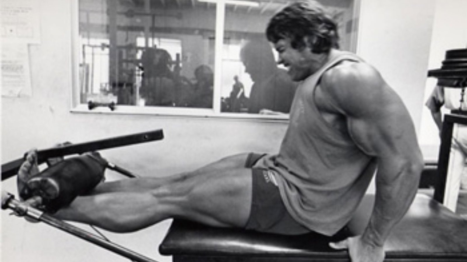 Arnold training his legs with leg presses